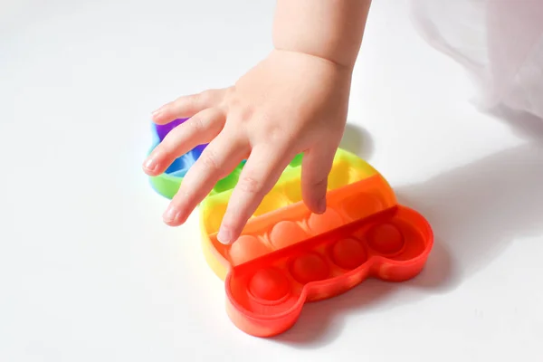 hand motor skills. A popular silicone toy for stress relief and motor development. Reusable pupyriki.