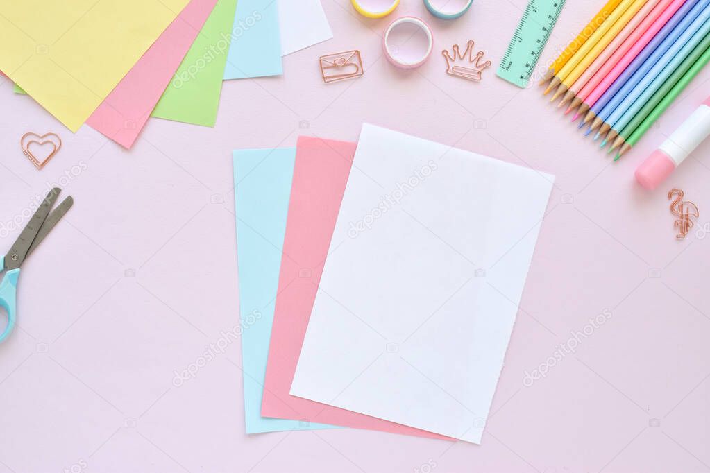 DIY. Paper ice cream with kids at home. Step-by-step instructions. Top view. Step 1. Prepare sheets of colored paper. Popsicle