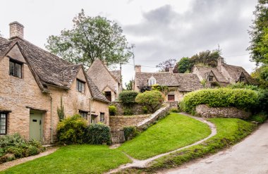 Houses of Arlington Row in the village of Bibury clipart