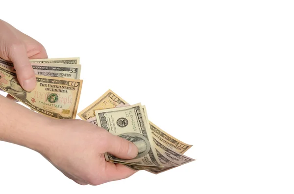 Dollari nella mano di un uomo isolato su bianco — Foto Stock