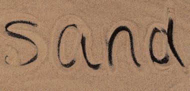 siyah arka plan üzerine kum