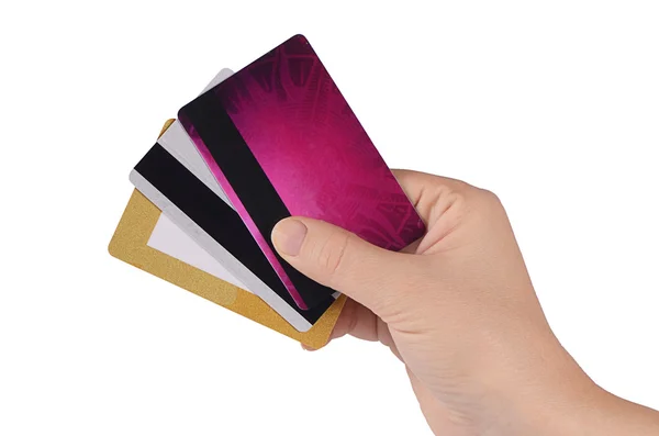 บัตรเครดิตในมือถูกแยกจากพื้นหลังสีขาว — ภาพถ่ายสต็อก