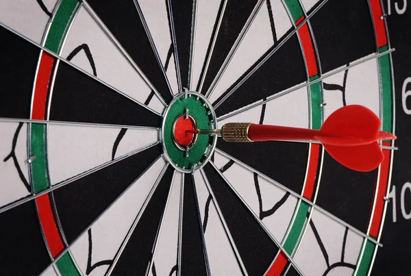 Darts on a black background — Stock Photo, Image