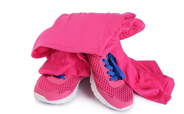 Αθλητικές φόρμες ροζ χρώμα που απομονώνονται σε λευκό — Φωτογραφία Αρχείου