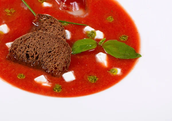 Soup from baked tomatoes with pesto — Stock Photo, Image