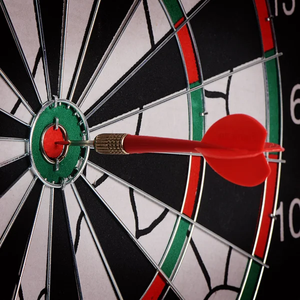 Darts on a black background — Stock Photo, Image