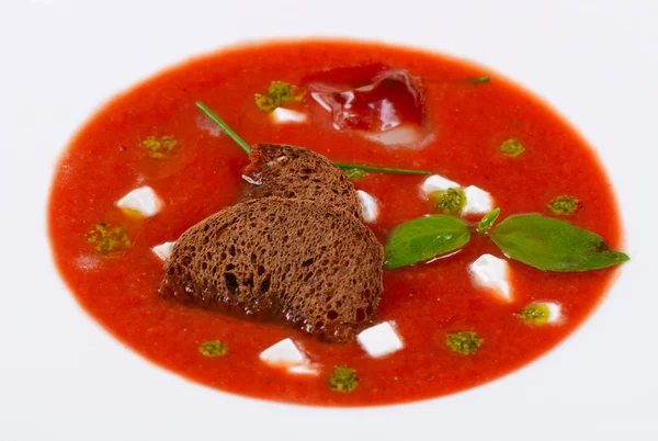 Soup from baked tomatoes with pesto — Stock Photo, Image