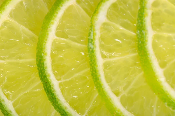 The fresh lime a background closeup — Stock Photo, Image