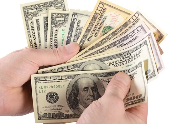 Dólares na mão de um homem isolados em branco — Fotografia de Stock