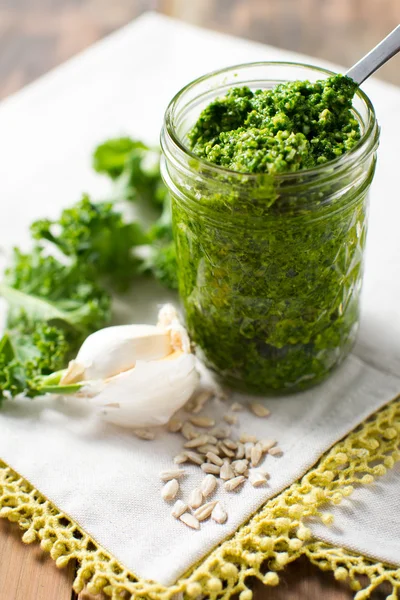 Kale Pesto sauce on white tasting spoon — Stock Photo, Image