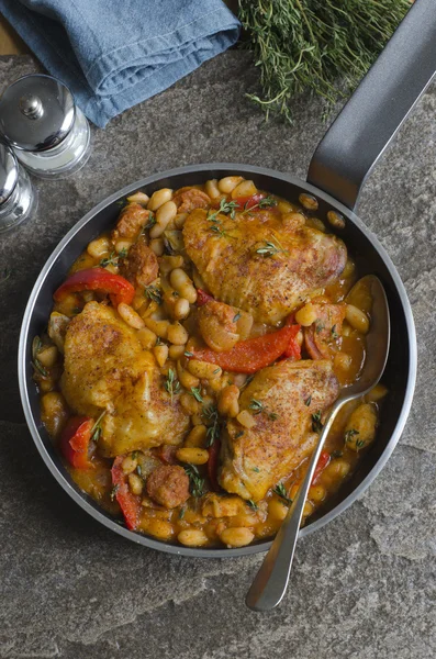 Spanish chicken with beans — Stock Photo, Image