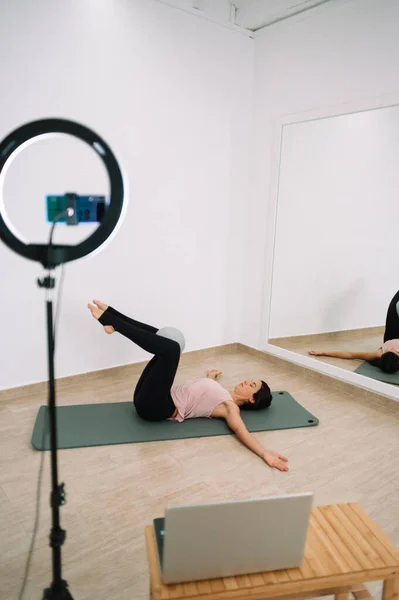 Online pilates yoga class at studio