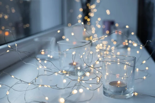 Close Burning Tea Candles Glasses Sill Led Lights Garland Hygge — Stock Photo, Image