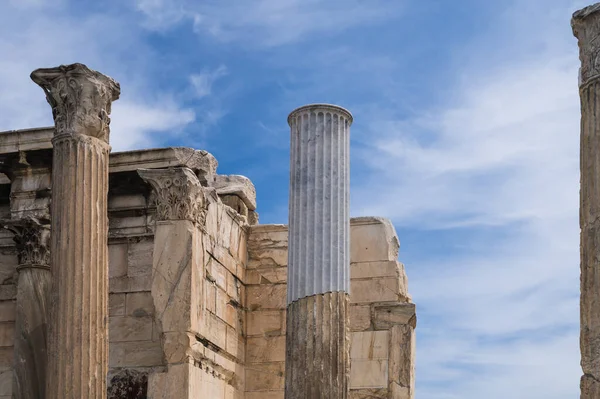 Hadrian\'s Library in Athens, Greece. View of wall and columns. Cloudy sky. Ancient architecture. History of Europe.