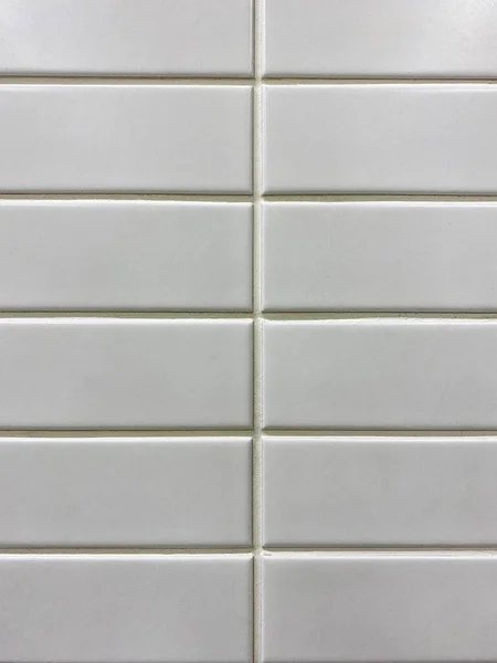 Dikdörtgen arkaplan. Beyaz dikdörtgen mozaik döşeme dokusu. banyo fayansları