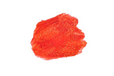 Kırmızı boya lekesi. Altın konfeti kırıntılarıyla boyanmış bir leke..