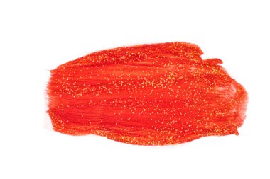 Kırmızı boya lekesi. Altın konfeti kırıntılarıyla boyanmış bir leke..