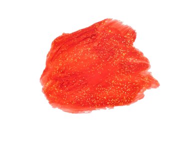 Kırmızı boya lekesi. Altın konfeti kırıntılarıyla boyanmış bir leke..