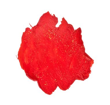 Kırmızı boya lekesi. Altın konfeti kırıntılarıyla boyanmış bir leke..