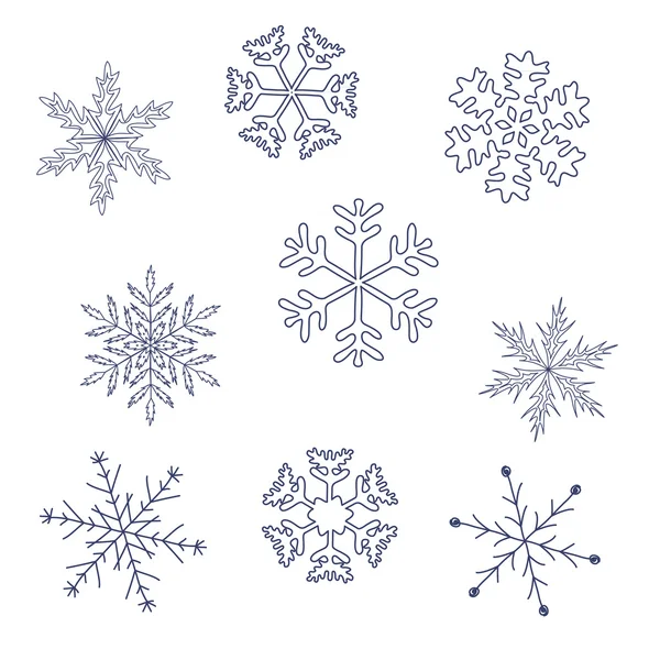 Набір ручних намальованих сніжинок — стоковий вектор