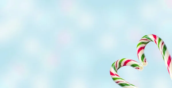 Christmas Horizontal Background Lollipops Blue Background Blur Bokeh Poster Banner — Stock Photo, Image