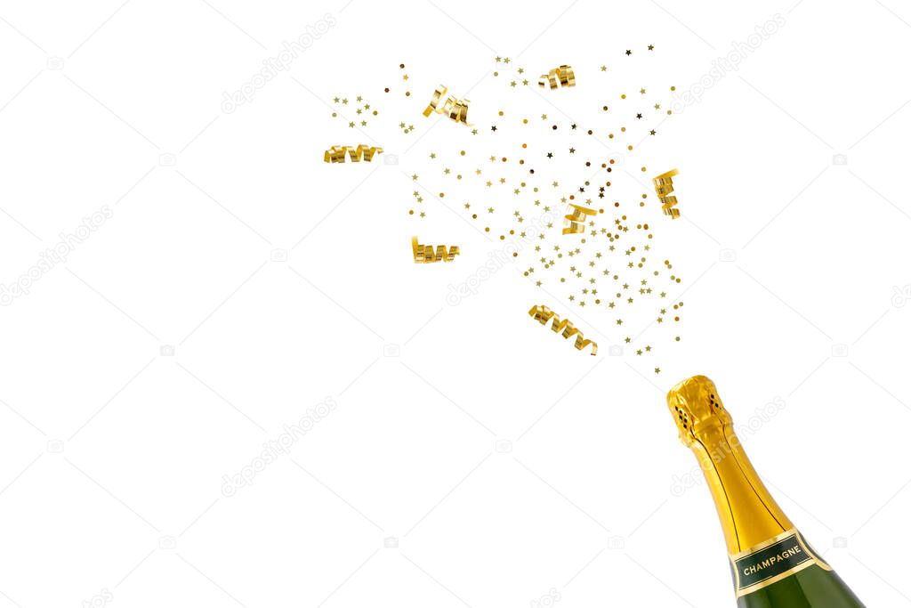 Champagne bottle with golden confetti isolated on white background. Birthday or New Year celebration. 