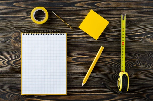 Notebook and technical tools on the table — Stock Photo, Image