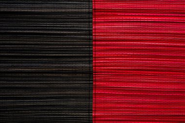 Red and black bamboo mat texture or background clipart