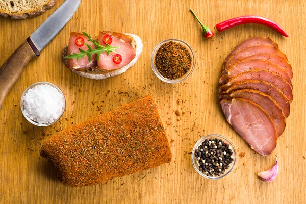 Dried pork meat sliced and sandwich top view — Stock Photo, Image