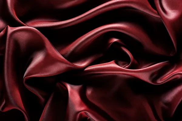 Абстрактная волна текстильной текстуры или фона в цвет марсалы — стоковое фото