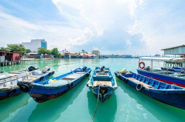 Boats at the Chew Jetty which is one of the UNESCO World Heritage Site in Penang.