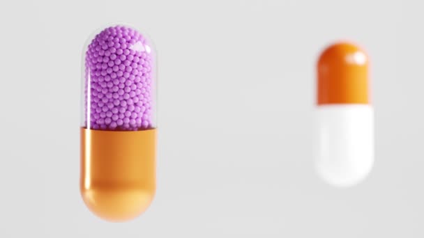 Transparante kleurrijke capsules met gegranuleerde vulling, geïsoleerd op witte achtergrond. Medische pillen, tablet, vaccin of dope, farmaceutische medicijnen, vitaminen, aminozuur, mineraal, voedingssupplement. — Stockvideo