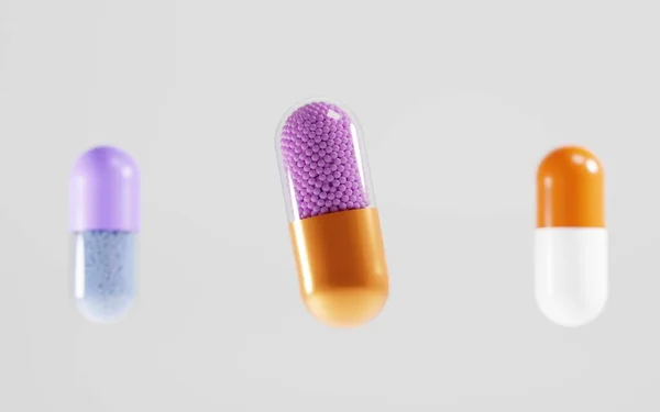 Gyllene medicinska piller med transparent rosa granulerat fyllmedel på isolerad vit bakgrund. Sätt färgglada kapslar, tillsluten klar glas- och plastflaska, vitaminer eller doping. Realistisk 3D-illustration — Stockfoto