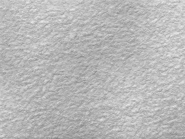 Tek renkli doku arka planı. Görüntü siyah ve beyaz tonları içerir. Yüzey sert görünüyor. Gri yazdırma ögesi.