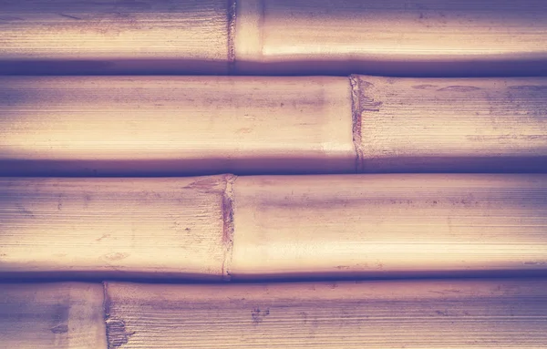 Vintage toned detailed grunge background made of bamboo sticks — Stock Photo, Image