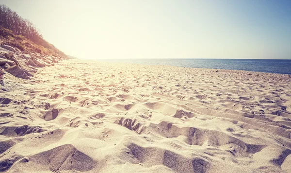 Vintage praia tonificada ao pôr do sol . — Fotografia de Stock