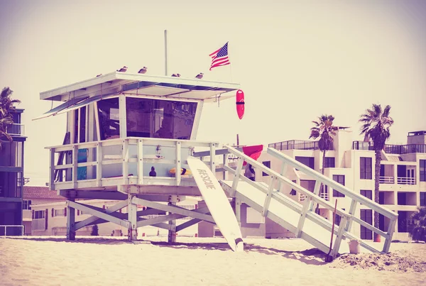 Retro toned picture of a lifeguard tower. — Stock Photo, Image