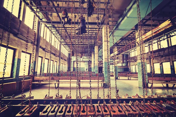 Vintage toned rusty chains in old abandoned coal mine. — Stock Photo, Image