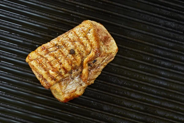 Imagen de cerca de un lomo de cerdo asado — Foto de Stock