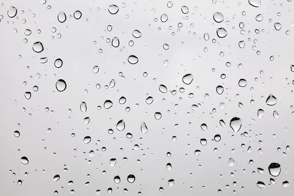 Gotas de chuva em um copo empoeirado . — Fotografia de Stock