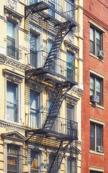 Old building with iron fire escape,  New York City, USA.