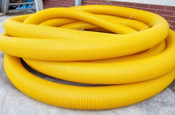 Tubo Drenagem Terra Bobina Amarela Chão Usado Para Remover Água — Fotografia de Stock