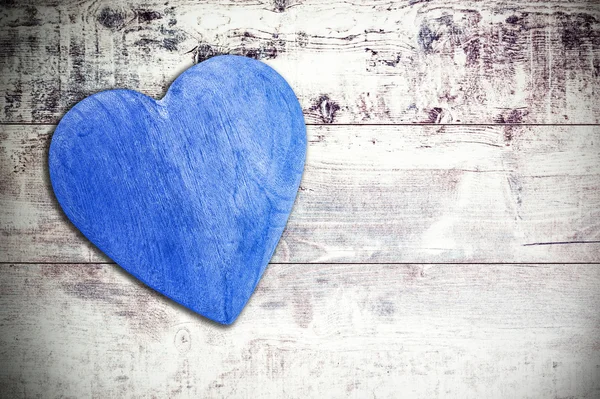 Wooden blue heart on timbered background, space for text. — Stock Photo, Image