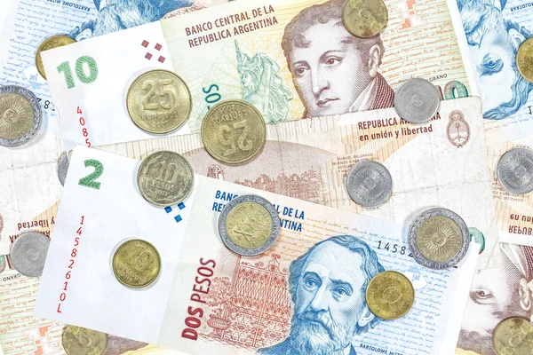 Dinero de Argentina, billetes y monedas en peso . — Foto de Stock