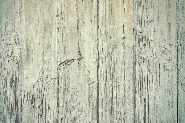 Alte Holzbretter mit abblätternder Farbe. — Stockfoto