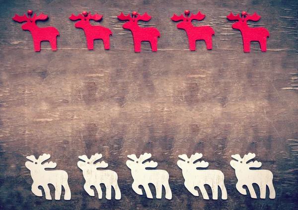 Vintage jul bakgrund, älgar på trä bakgrund. — Stockfoto