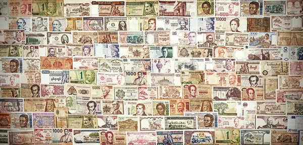 Retro filtered banknotes from all over the world. — Stock Photo, Image