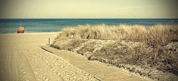 Retro toned panoramic photo of a beach. — Stock Photo, Image