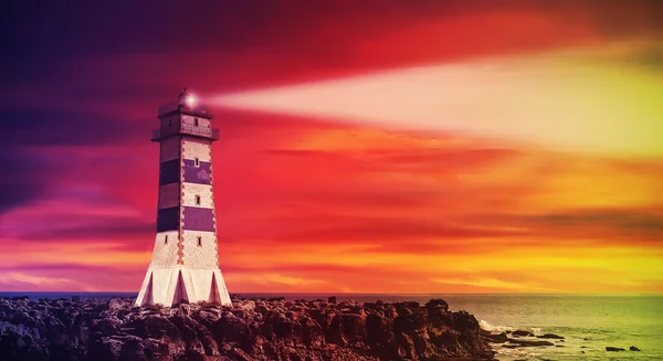 Seascape with lighthouse at sunset, high saturation style. — Stock Photo, Image