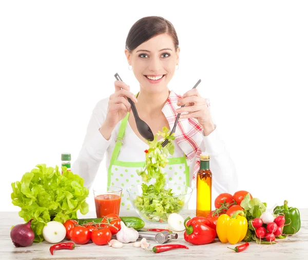 Happy housewife preparing salad. — Stock Photo, Image